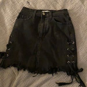 Black denim mini skirt